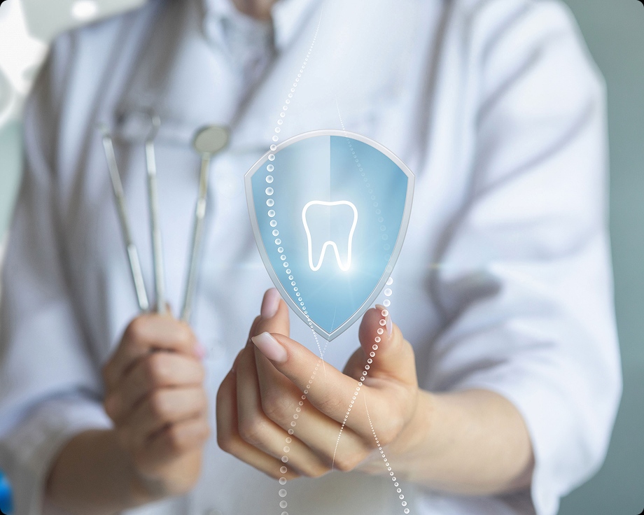Dentist holding icon with tooth