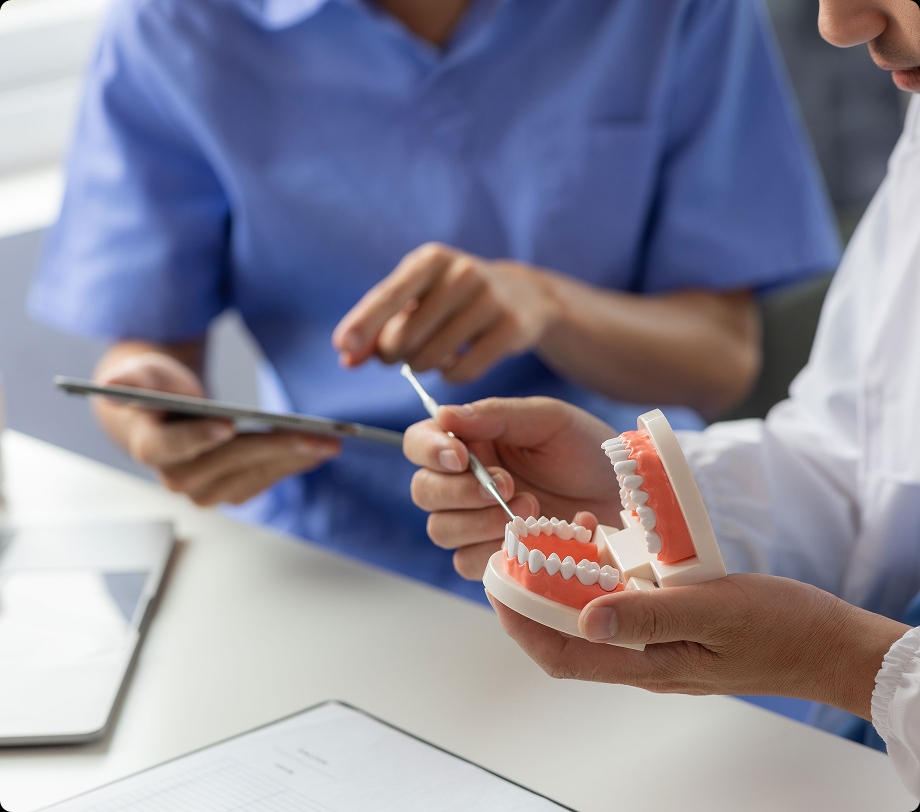 Dentists taking and explaining treatment