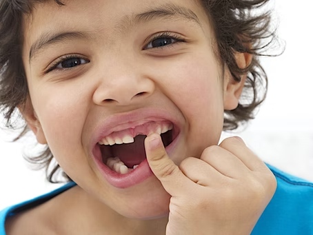 Young boy missing tooth